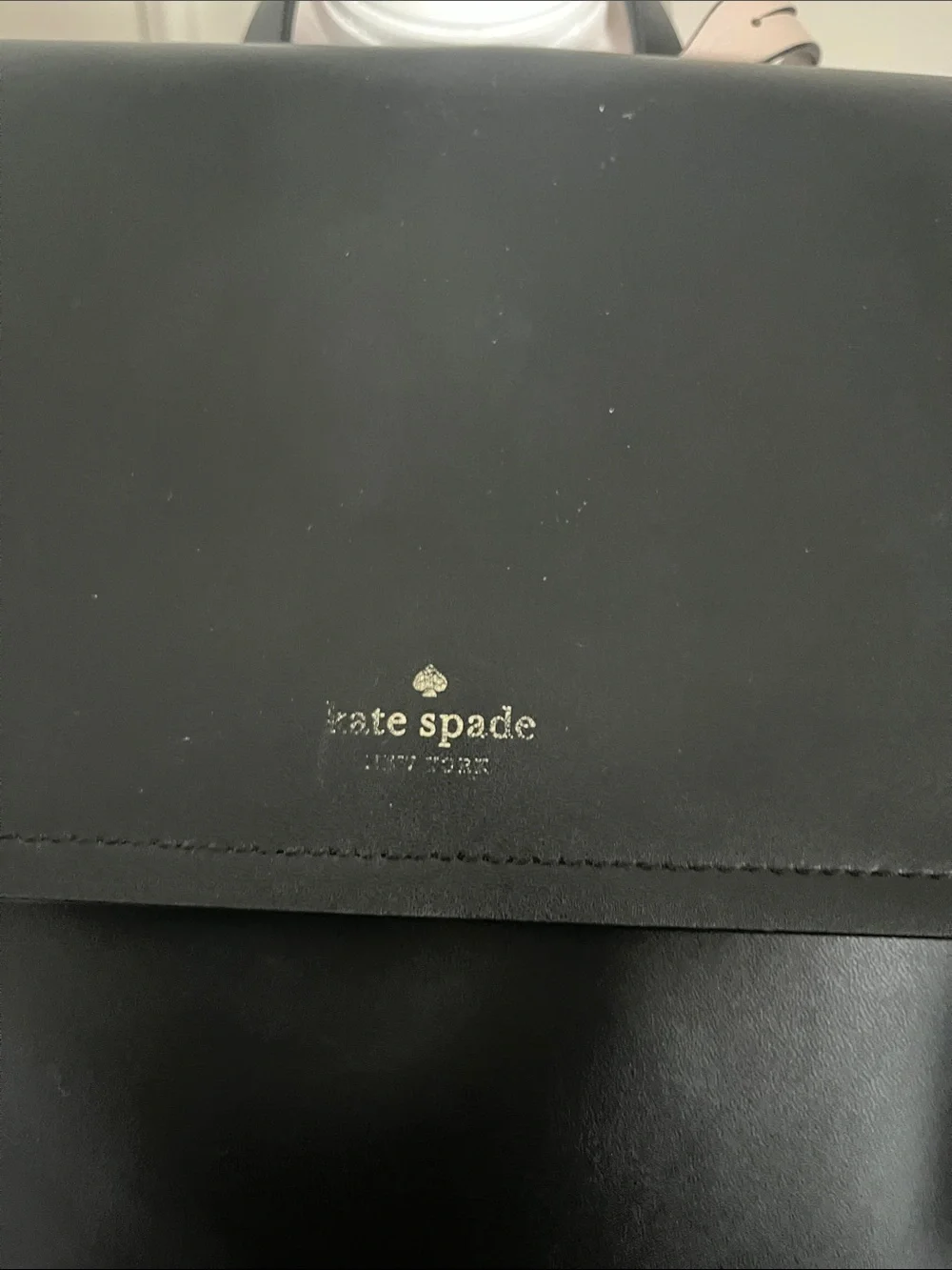 kate spade Black Smooth Leather Backpack with Gold Logo